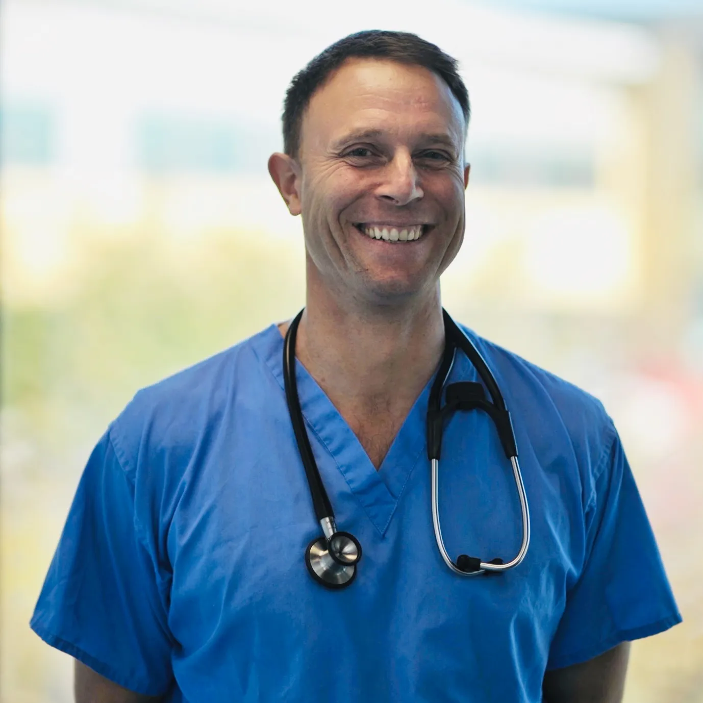 Dr Mark Tonzing